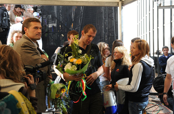 Olimpiečiai į artimųjų glėbį