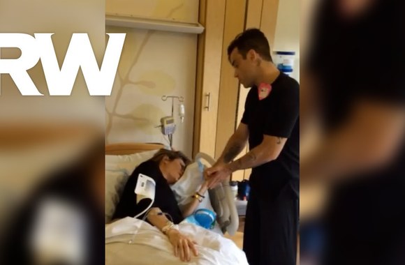 VIDEO kadras: Robbie Williamsas žmonos gimdyme