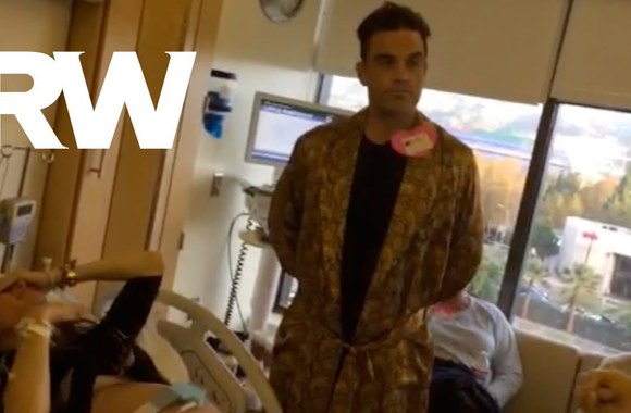 VIDEO kadras: Robbie Williamso žmonos gimdymas