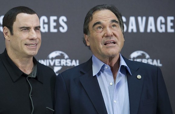 Johnas Travolta ir Oliveris Stone'as
