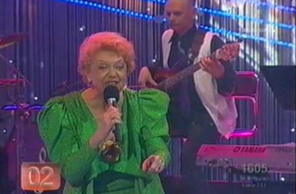 VIDEO kadras: Nijolė Tallat-Kelpšaitė – „Alyvos žydės“