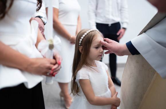 Krikštynų akimirka / Asmeninio albumo nuotr.