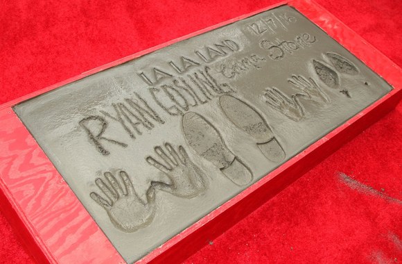 Emmos Stone ir Ryano Goslingo rankų ir kojų įspaudai