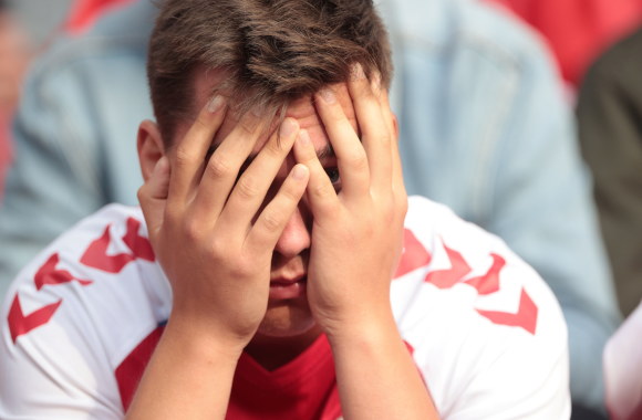 Per Danijos ir Suomijos rungtynes Europos futbolo čempionate sukniubo Ch.Eriksonas / „Scanpix“ nuotr.