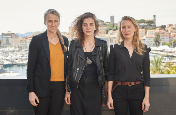 M.Kvedaravičiaus filmo „Mariupolis 2“ pasaulinė premjera Kanuose. Hanna Bilobrova – centre / Audriaus Solomino nuotr.