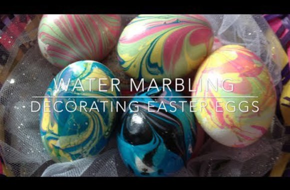 VIDEO kadras: Kiaušinių dažymas naudojant vandenį ir nagų laką