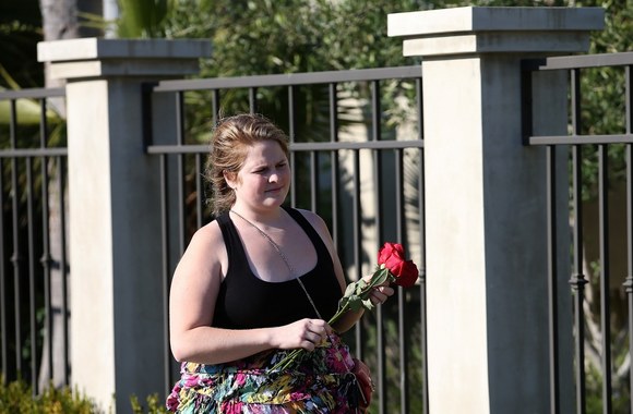 Robino Williamso gerbėja prie jo namų